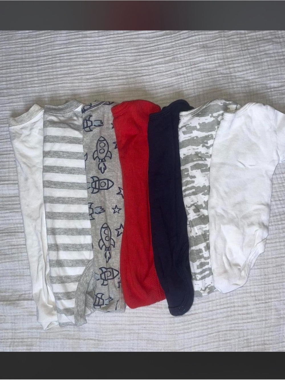Bundle of seven baby boy bodysuit onesies